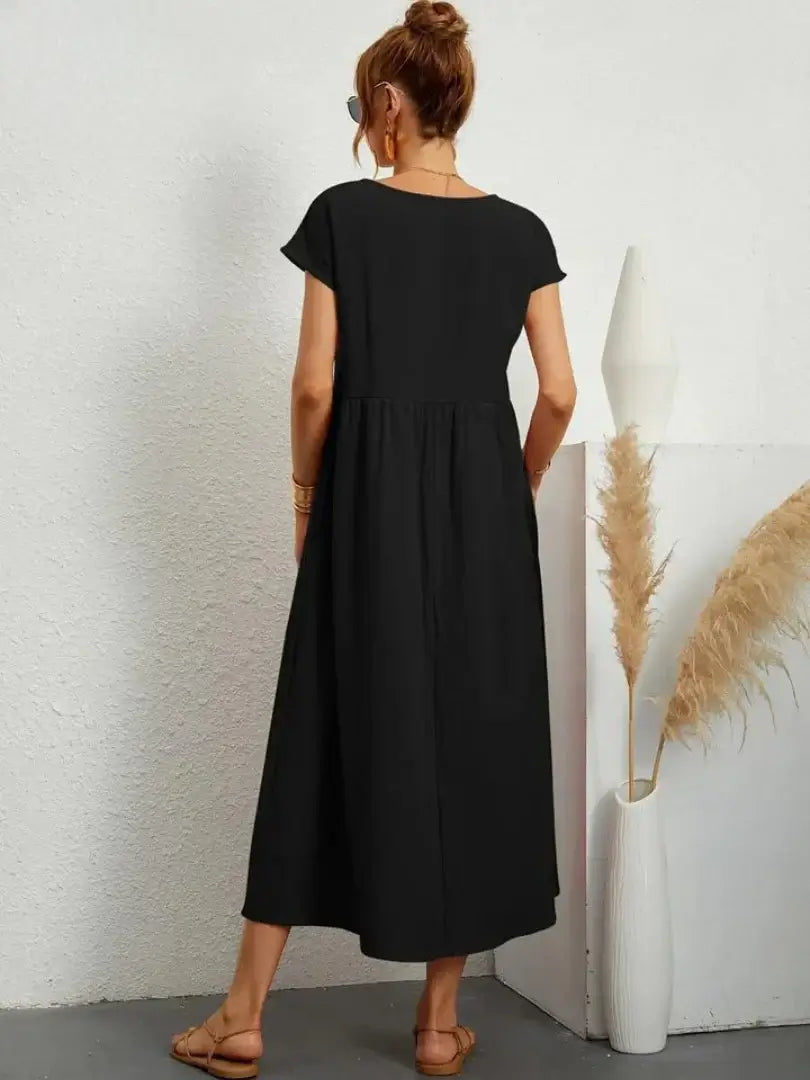 Celine | Robe midi à poches