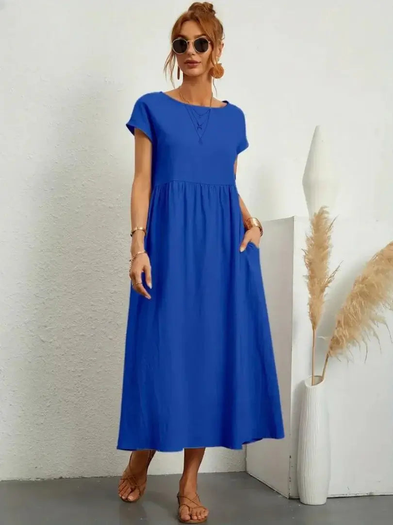 Celine | Robe midi à poches
