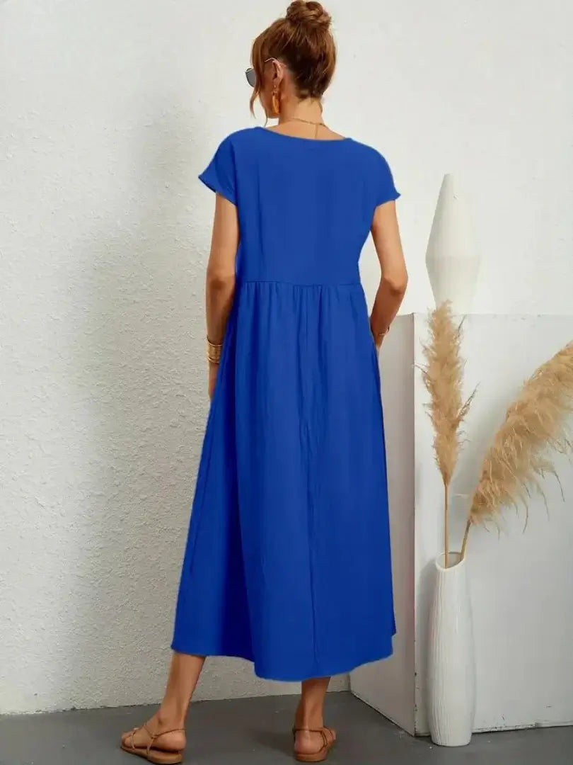 Celine | Robe midi à poches