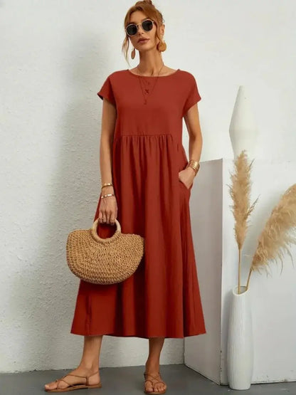 Celine | Robe midi à poches
