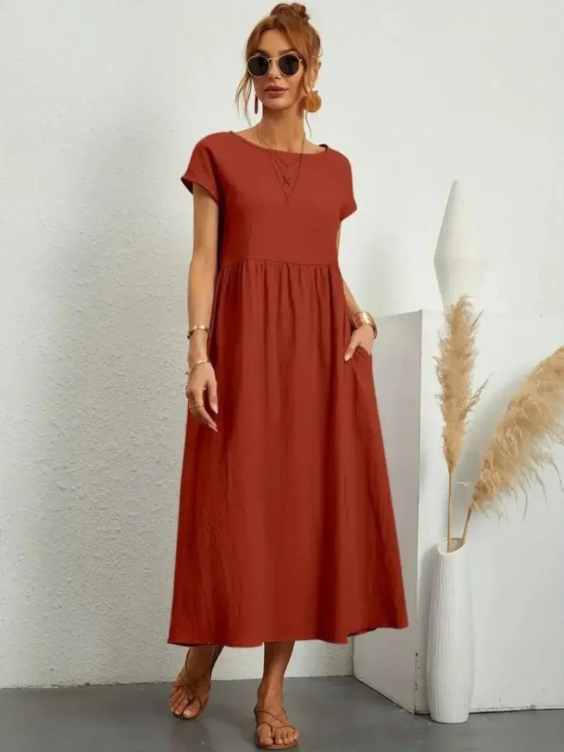 Celine | Robe midi à poches