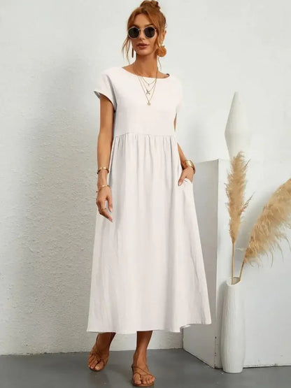 Celine | Robe midi à poches
