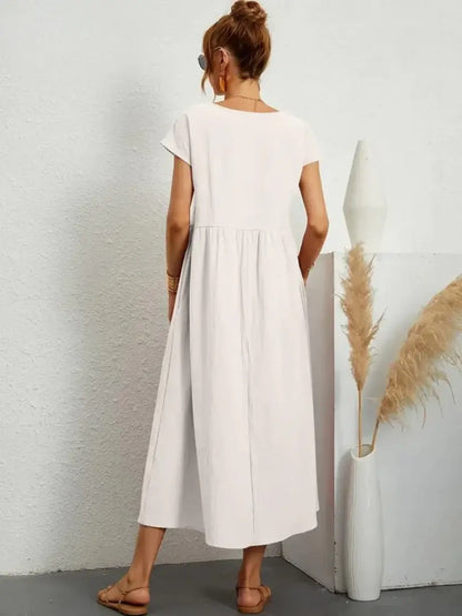 Celine | Robe midi à poches