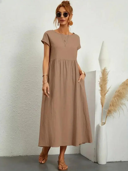 Celine | Robe midi à poches