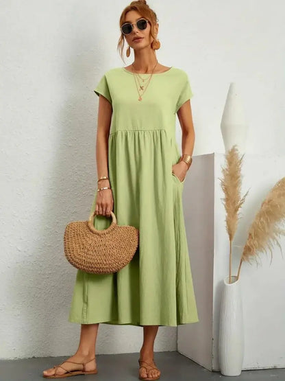Celine | Robe midi à poches