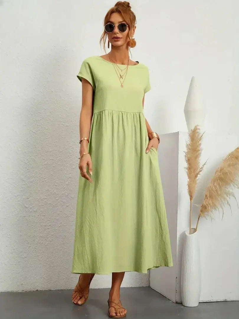 Celine | Robe midi à poches