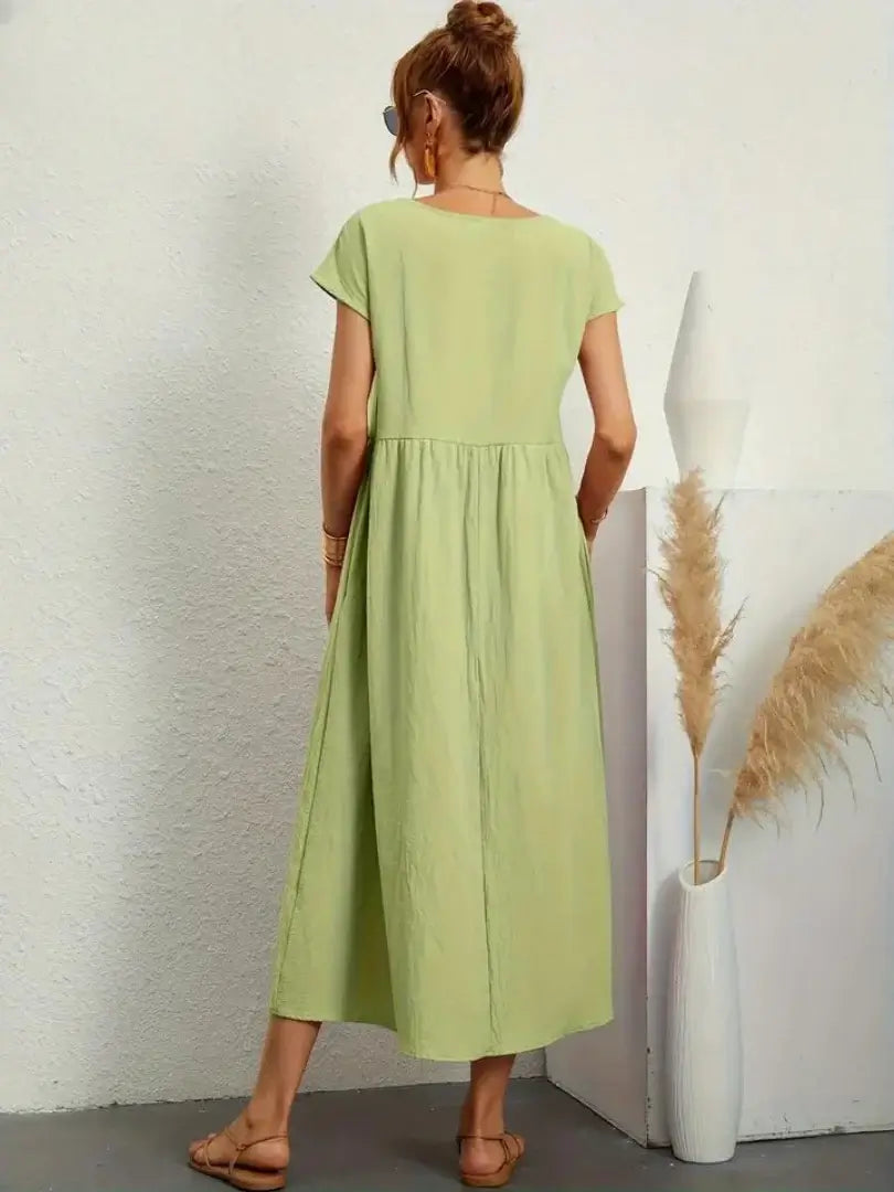 Celine | Robe midi à poches