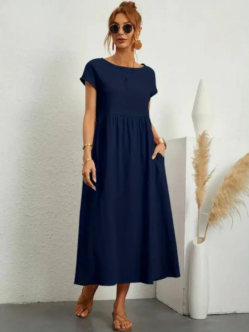 Celine | Robe midi à poches